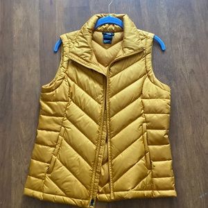 Mustard yellow north face puffy vest size S